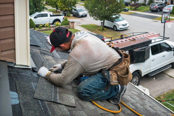 Professional Roof Replacement technician working in Tariffville, CT